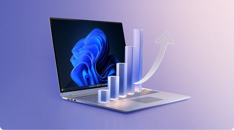 Laptop over which is superimposed a chart with rising 3D growth bars and an upward arrow.